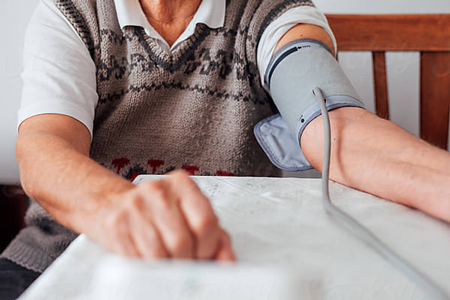 image of man taking his blood pressure